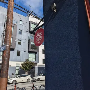 a red sign on a blue building