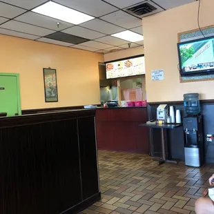 a woman sitting at the counter