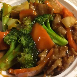 Beef and broccoli with added carrots.