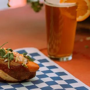 Grab a dog from Der Wurst Hot Dogs and a draft beer and enjoy our patio!