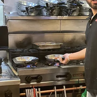 a man in a kitchen