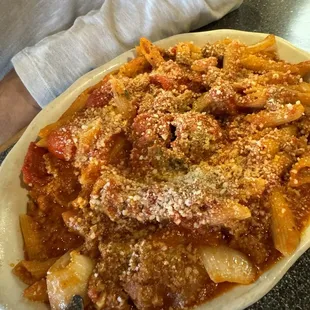 Bolognese over ziti with a homemade meatball added