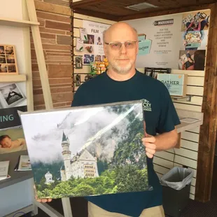 A customer getting his gallery wrap. .