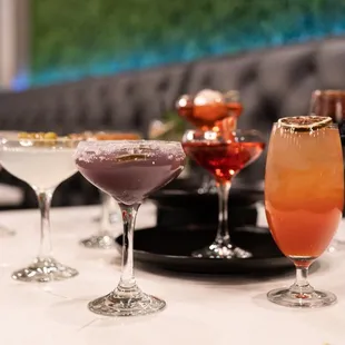 a variety of cocktails on a table