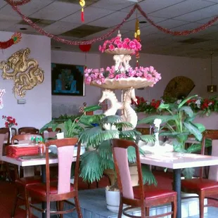 Fountains inside middle of restaurant