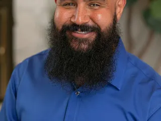 Daniel Bearded Broker Baca