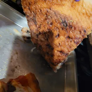 Tried to air fry it to crisp us soggy wet crust. You can see the wetness.
