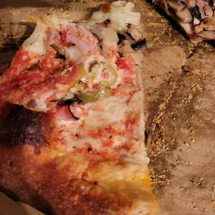 No sauce on this piece either...whole pizza bland without marinara sauce.
