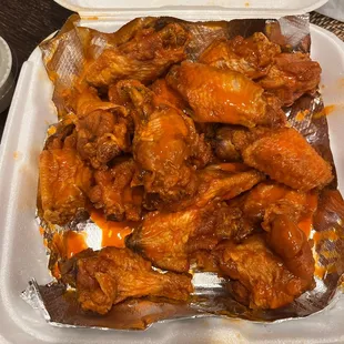 Medium wings.  I always ask for extra sauce on the side because not everyone in this house wants the extra sauce...