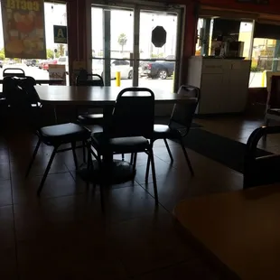 a table and chairs in a restaurant