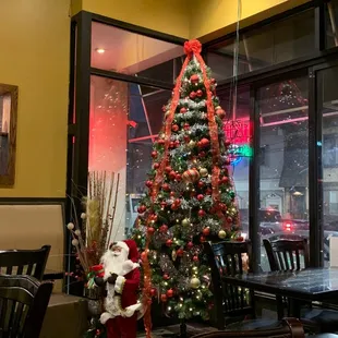 a christmas tree in a restaurant