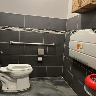 Baby changing station located in women&apos;s bathroom.