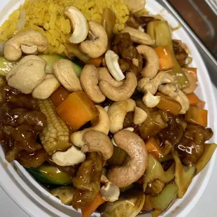 a plate of cashews and vegetables