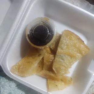 a container of food and a drink
