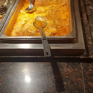 This is enchiladas. This is a salt block and cheese in a canned sauce.