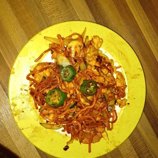 Stir fry chicken with noodles and veggies.