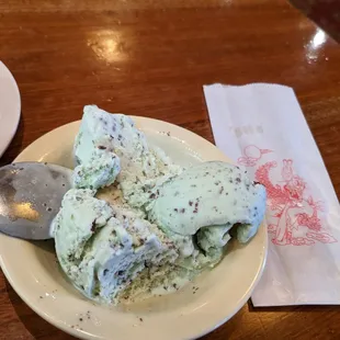 a bowl of ice cream and a spoon