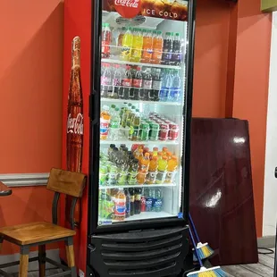 a refrigerator and a chair