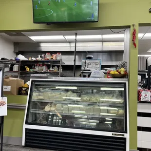 a man standing in front of the counter