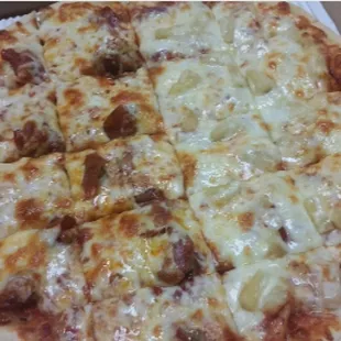 Linwood Pizza: half Sausage/Pepperoni and half Hawaiian.