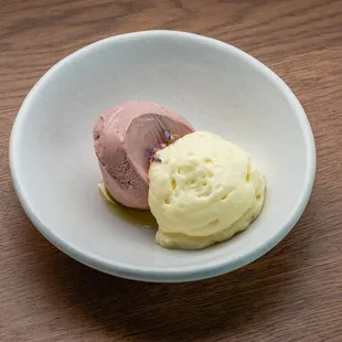 Strawberry Ice Cream with a sweet ricotta mousse and anise hyssop flowers.