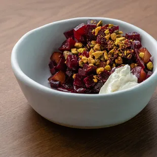 Heirloom beets that are salt roasted and served with black velvet apricot, Sicilian pistachio and horseradish &amp; goat cheese.