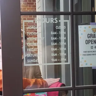 Hours on the door.
