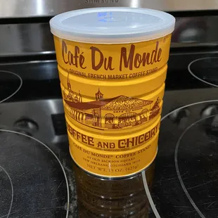 a cup of coffee on a stove