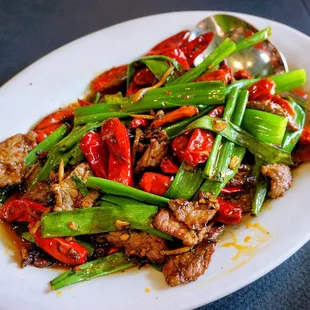 Chili Cumin Beef: sirloin with spring onions, douban jiang, cumin spice blend, chili ($27).