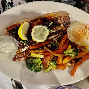 Blackened salmon with mashed potatoes and an excellent vegetable medley.