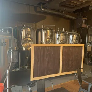 a row of beer tanks