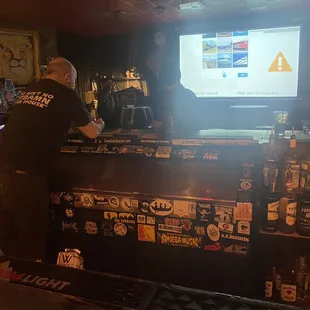 a man behind the bar