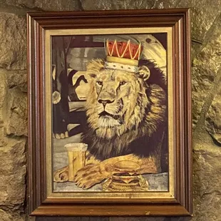 The lion himself, enjoying a beer.