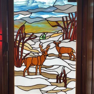 Deer stained glass.