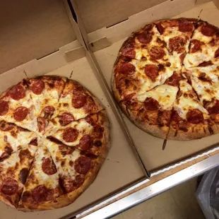 two pepperoni pizzas