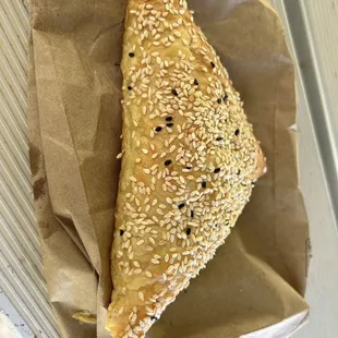 a piece of bread with sesame seeds