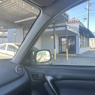 View from my SUV of the front shop.