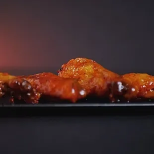 ows a hand holding a knife