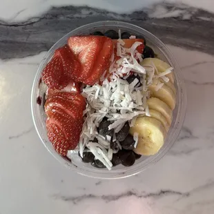 Classic Bowl: açaí, granola, banana, blueberries, strawberries, coconut, agave.