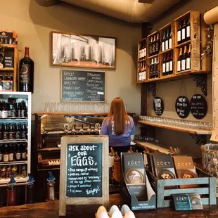 a woman sitting at a counter