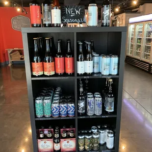 a shelf full of beer