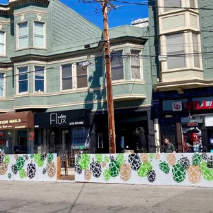 a row of buildings on a city street