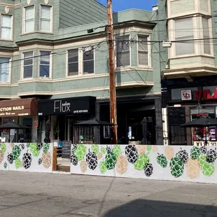 a row of shops along a city street