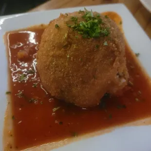 Tapa: Rice Ball includes arborio rice, mozzarella, peas, ground beef, tomato sauce. A+