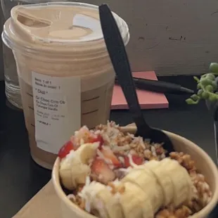 a bowl of cereal and a cup of coffee