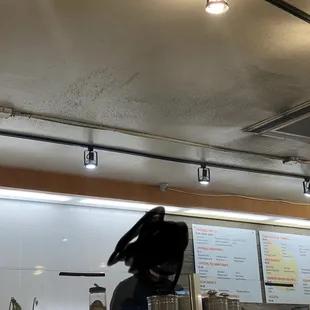 CAKED ON DIRT ABOVE WHERE FOOD IS PREPPED.