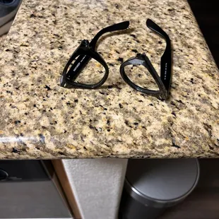 a pair of glasses on a counter