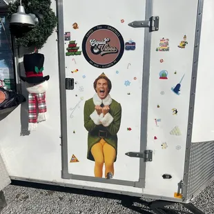  picture of a woman in a green coat and yellow pants