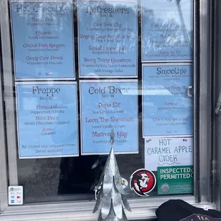  sign in the window of a restaurant