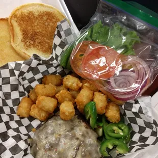 #11 fire station burger,  patty on the side.  Ordered medium rare and received it well done.